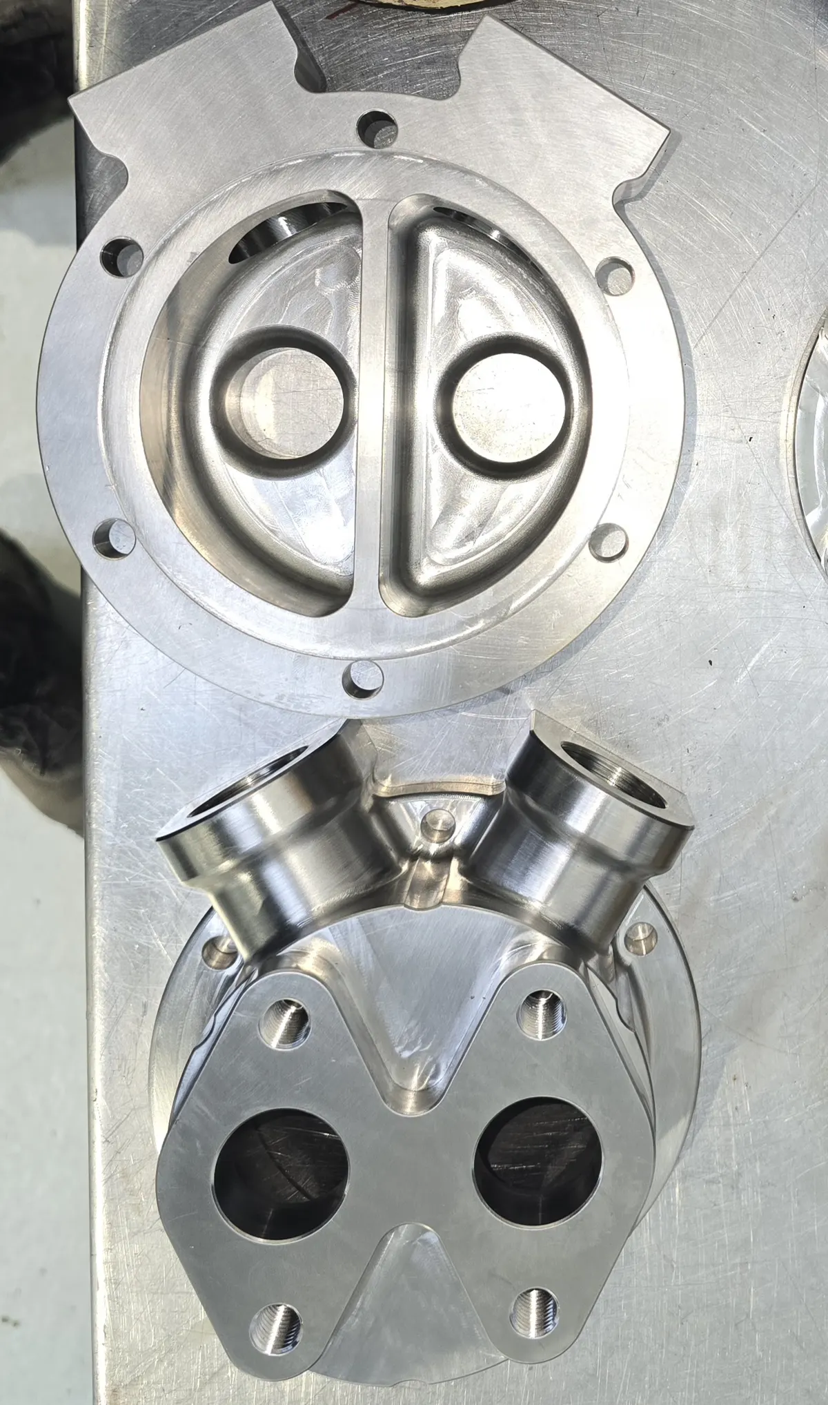 Reengineered heat exchanger caps
