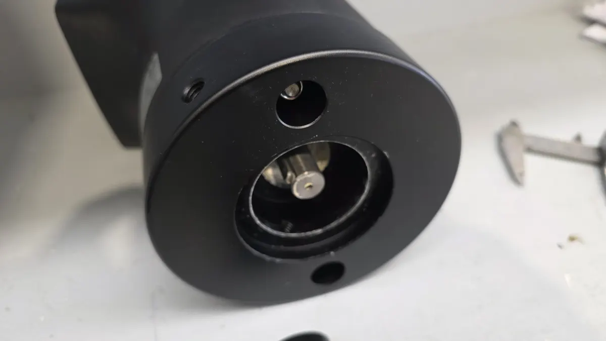 Custom adaptor joining a Quick motor to a Lighthouse winch