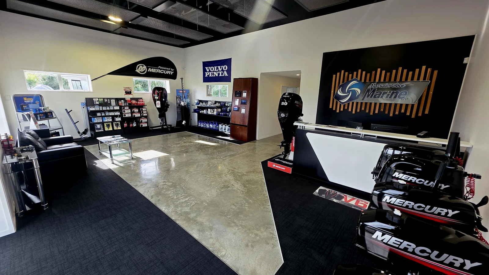 Marsden Cove Marine reception and showroom with Mercury outboards and the front counter